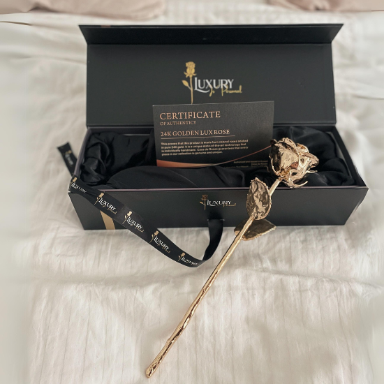 24k gold dipped rose on the bed rose outside